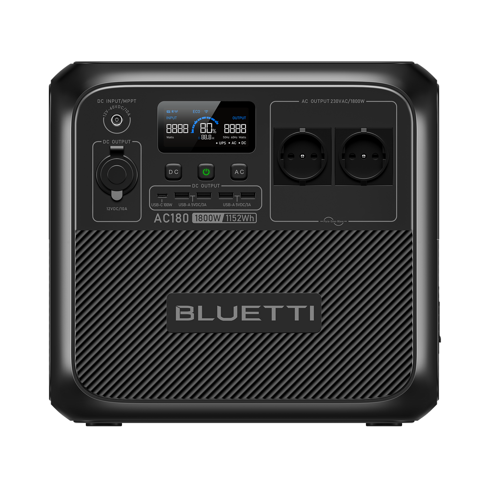A black BLUETTI AC180 portable power station with multiple ports and indicators on the front panel.